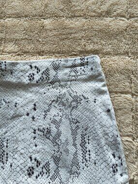 Reverse White Snake Print Mini Skirt